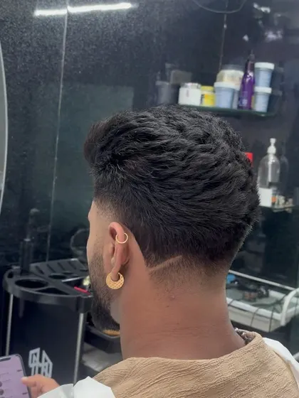 A fade with a line design, adding a custom touch.