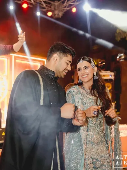 The happy couple enjoying their 'Midnight Marrakesh' Sufi night. The vibrant, warm, and soulful atmosphere was the perfect setting for their celebration.