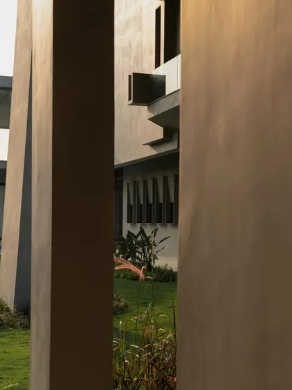 Various exterior perspectives that capture the dynamic geometry and the dance of light and shadow across the concrete surfaces throughout the day.