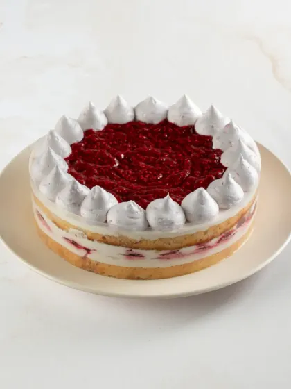 The Lite Raspberry Tres Leches Cake is topped with a vibrant raspberry puree, giving you that lovely berry flavour in every bite.