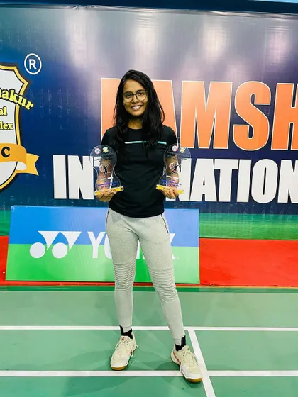 A solo shot of Prishita with her well-deserved trophies, a reward for her dedication and high-performance training.