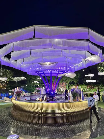 The circular bar again, this time with a purple-lit canopy, showing how I can customize the lighting to match any theme.
