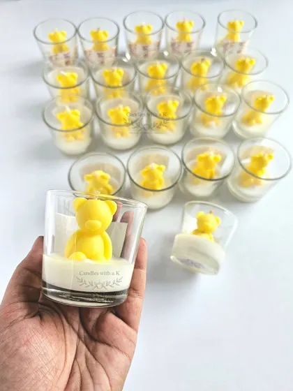 These cheerful yellow teddy bear candles were created for a baby shower in Mohali. Each one is handmade from 100% soy wax with a lovely Japanese Cherry scent.
