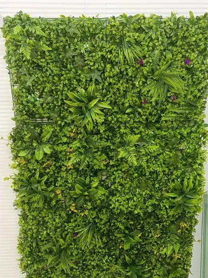An artificial vertical garden panel designed to fit in an awkward space under a staircase. This is a great way to add life to a corner that is often overlooked.