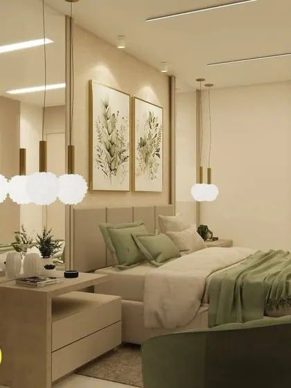 A close-up of the bed and nightstand, showing the reflection in the mirror which creates a sense of depth.