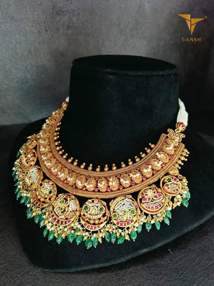 This piece is a perfect example of how we can breathe new life into a family treasure. We refurbished this traditional necklace, adorning it with Basra pearls, rubies, and emeralds to create a piece that honors its past while shining brightly in the present.