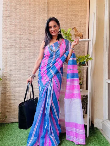 The bright pink and blue checks on this pre-stitched cotton saree are so fun and vibrant. It's a great piece for a casual, colorful look.