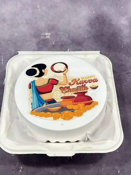 This Karwa Chauth bento cake features a beautiful edible print of the traditional ceremony, making it a thoughtful and symbolic treat for the occasion.