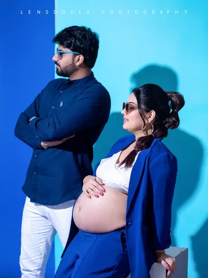 A fierce and modern maternity look. Using bold color-blocking and confident poses, we can create a high-fashion, editorial-style pregnancy portrait that is truly unique.