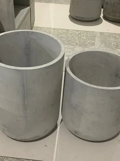 A pair of my standard cylindrical concrete planters.