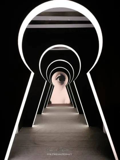 For a sangeet inspired by the artist Yayoi Kusama, we created an immersive experience starting with this grand keyhole entrance. It set the tone for an evening of illusion and artistry, inviting guests into a world where decor becomes a bold statement.