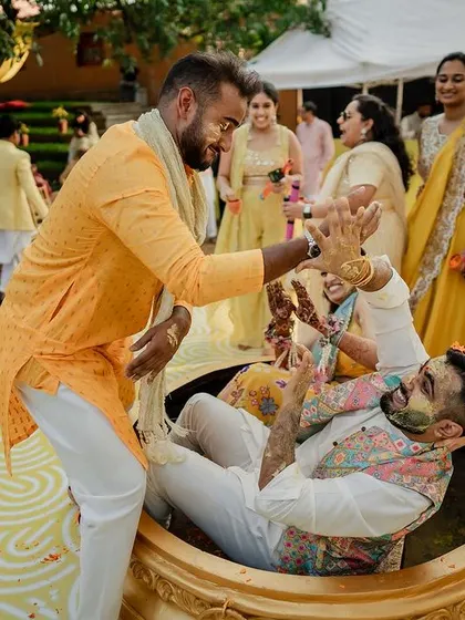 A collection of fun and vibrant moments from a sun-drenched Haldi. From playful entries to candid portraits, we capture the complete story of this joyous celebration.