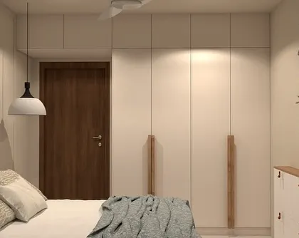 A 3D render of a guest bedroom, showcasing a calm and neutral design with a wooden bed, white wardrobes with long wooden handles, and soft, ambient lighting from pendant lamps.