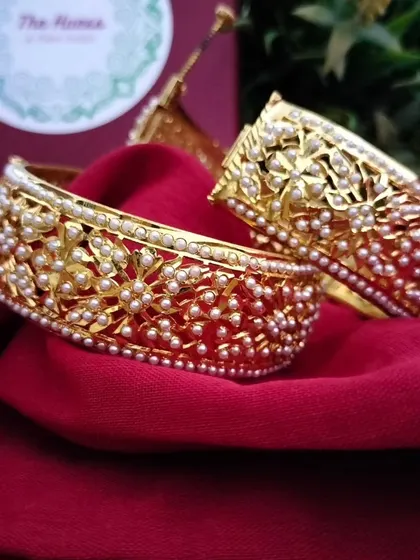 A pair of the 'रातरानी' (Rat-rani) bangles, showcasing their intricate craftsmanship.