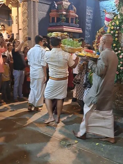Ritual offerings being carried into the temple during the festival. Every community has a specific role to play in the nine day event.