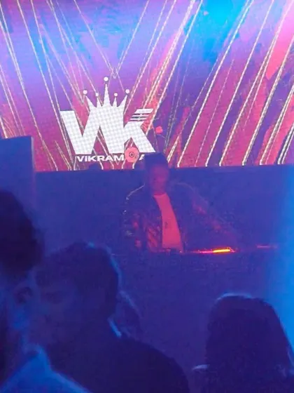 A closer look at me on the decks at White Lotus, with my logo prominent on the screen behind me.