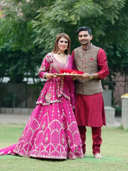 The couple posing together during their Karwa Chauth celebration, looking picture-perfect.