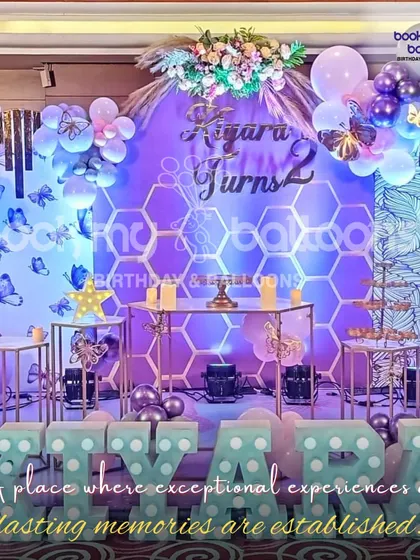 This butterfly themed setup for Kiyara's second birthday shows how we establish exceptional experiences and lasting memories. The intricate details and beautiful lighting create a truly magical place.