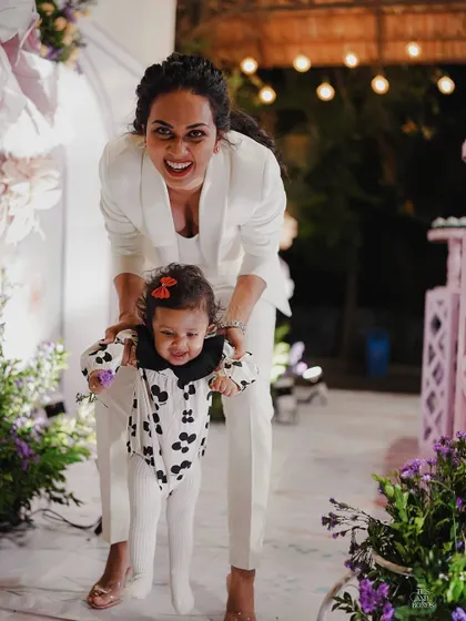 Pure joy! A mother and her little one share a happy moment at their fairytale-themed party. I design events that are not just beautiful, but also full of fun and opportunities for connection.