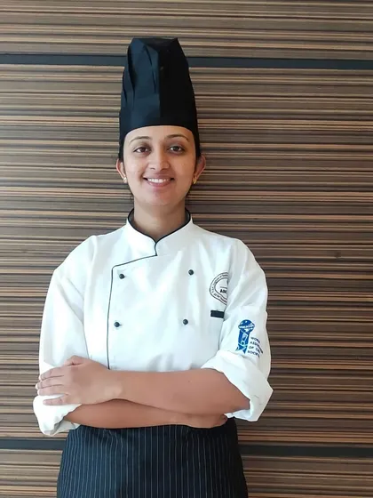 In my chef's uniform, ready to create delicious and memorable food experiences. This is more than a job for me, it's my passion.