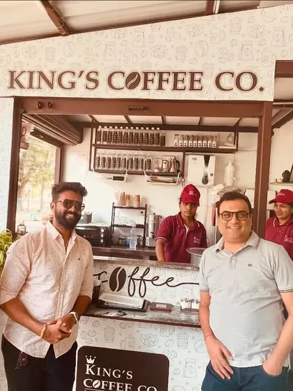 Our team with the founders of King's Coffee Co. at their original kiosk. This image shows the beginning of a success story that we are now helping to scale into a national franchise.