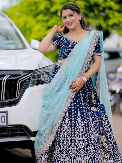 This client is the picture of elegance in her custom-designed reception lehenga.