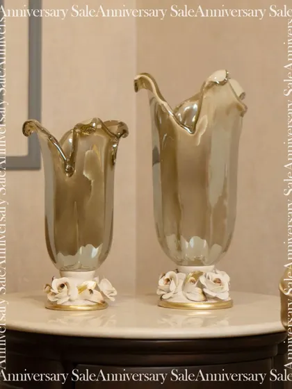 A pair of elegant vases from my Murano collection. Their unique shapes and lustrous finish make them beautiful statement pieces, perfect for holding flowers or standing alone as works of art.