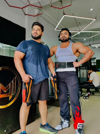 With my friend Arman Khan in the gym.
