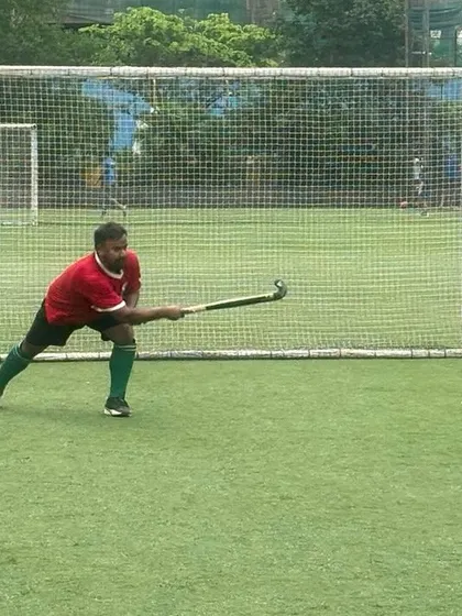 A player practices his drag flick, a crucial skill for scoring from penalty corners. Our training sessions include dedicated time for mastering specialized techniques like this.
