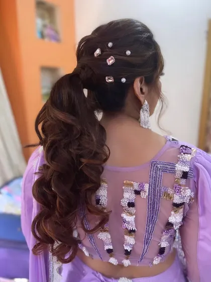 Another angle of the crystal-adorned ponytail, showing its sparkle and texture.