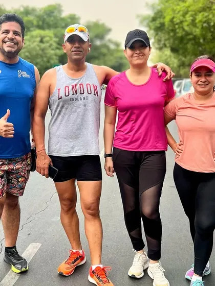 The group posing together during an anniversary run. We love celebrating the love and partnership of our members.