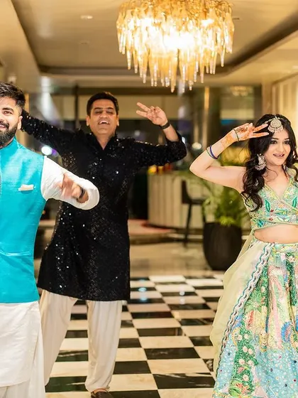The bride, groom, and their friends having a blast on the dance floor. My goal is to make everyone feel comfortable enough to let loose and have fun.