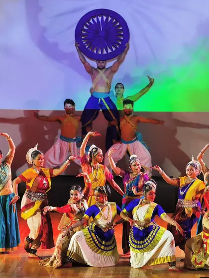 A patriotic performance where my dancers form a pyramid, with one artist holding the Ashok Chakra. This kind of formation work is a key feature of our large ensemble pieces.