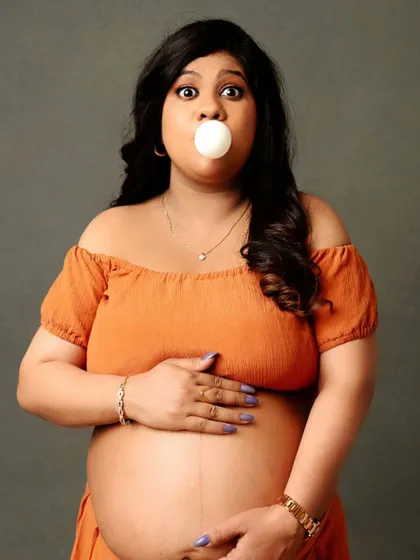 A quirky and memorable portrait that shows the fun side of the mom-to-be. I love it when clients are up for creative ideas!