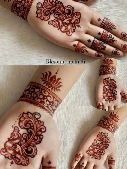 This single, bold paisley motif makes a beautiful statement. Paired with a simple wristband and finger details, it's a perfect example of minimalist art with a traditional touch.