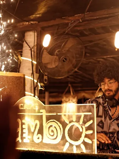 A great set needs a great stage. This shot from Cafe Mambo, framed by sparklers, shows how I integrate with full production setups to create a visually stunning experience that matches the intensity of the music.