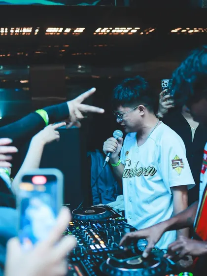 An artist hypes the crowd while I hold down the beat. These live interactions make each performance unique and full of energy.