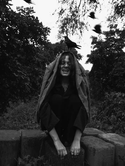A surreal and playful moment captured outdoors. This black and white image tells a story and shows a different, more experimental side of my work.
