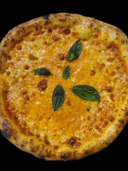 A perfect classic Margherita pizza, fresh from the oven. Featuring a crispy crust, rich tomato sauce, melted mozzarella cheese, and fresh basil leaves, it's a simple yet delicious option for all ages.