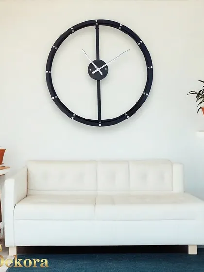 Simple, elegant, and easy to read, this minimalist clock complements a variety of interior styles.