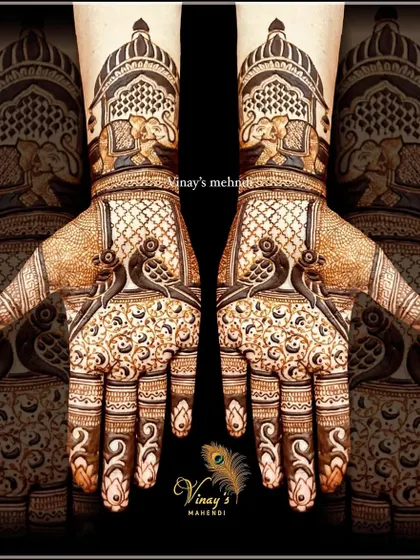 A royal short-hand design featuring birds on the palms and elephants within palace arches on the wrists. A perfect blend of fauna and architecture.
