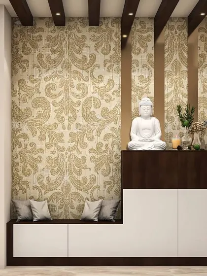 A serene entryway featuring a built-in bench and shoe cabinet against a damask-patterned wallpaper. The white Buddha statue adds a peaceful and spiritual element.