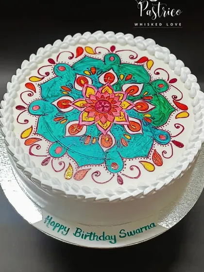 The full view of the hand-painted Mandala cake, a true piece of edible art.
