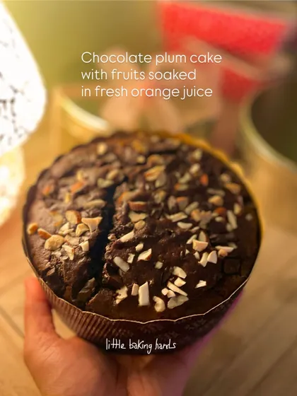 A non-alcoholic chocolate plum cake, with fruits soaked in fresh orange juice instead of rum. It's a delicious and family-friendly option for the holidays.