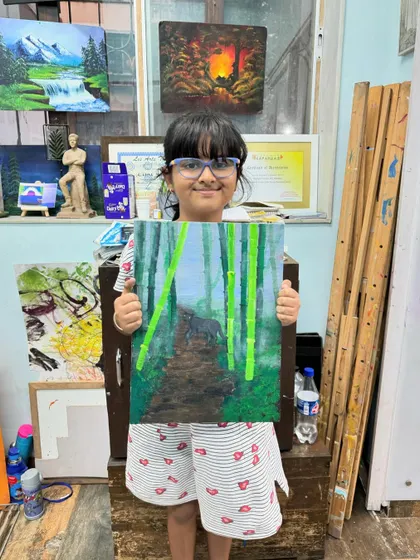 Even my younger students can master advanced techniques. This little artist did a fantastic job creating a sense of depth in her blurry forest painting.
