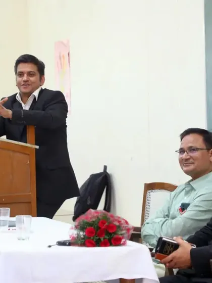 Sharing a lighter moment with the faculty and students during the interactive session at JNVU.