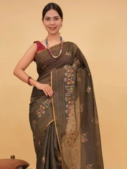 This earthy brown linen saree with delicate embroidery is another example of the variety in my 1-Minute collection. It’s a sophisticated choice for work or casual gatherings.