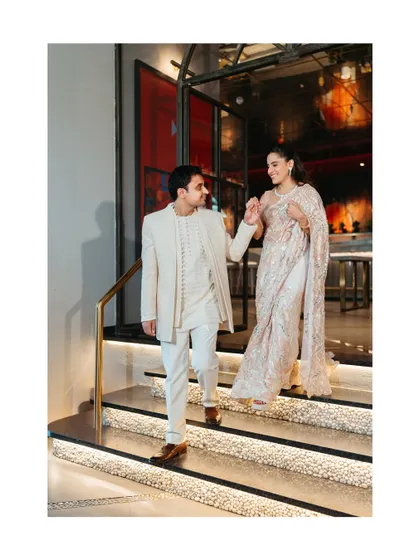 The grand entrance as a newly engaged couple. We love capturing these walking shots, filled with anticipation and the promise of the party ahead.