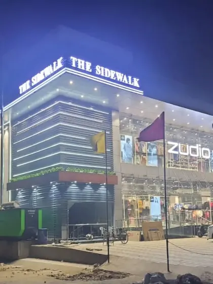 My work extends to large-scale commercial projects. This is "The Sidewalk" in Ghaziabad, a commercial building I designed and executed. The facade lighting and modern design create a powerful street presence, attracting businesses and customers alike.