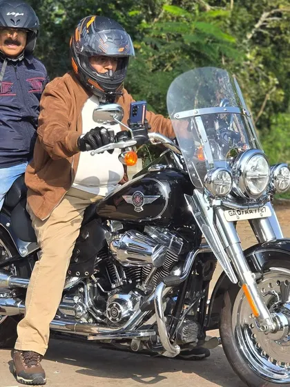 Even as a pillion, proper gear is important. Here you can see two riders on a Harley, both prioritizing safety.